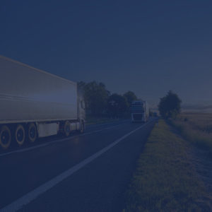 Lorries driving on a road to depict fleet insurance by Find Insurance NI