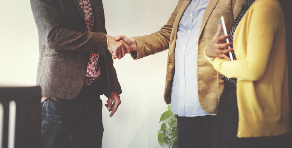 Friendly handshake for Find Insurance NI blog