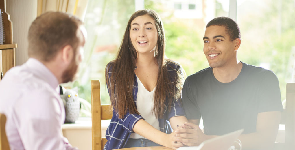 Couple looking delighted with landlord to depict landlord insurance by Find Insurance NI