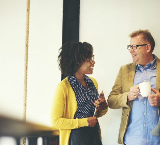 Group of workers laughing for Find Insurance NI blog