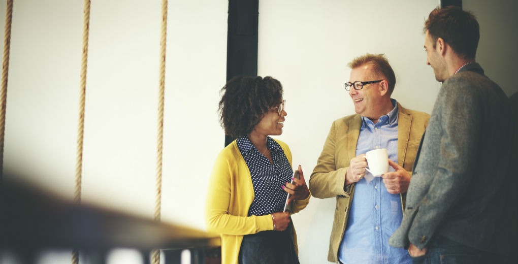 Group of workers laughing for Find Insurance NI blog