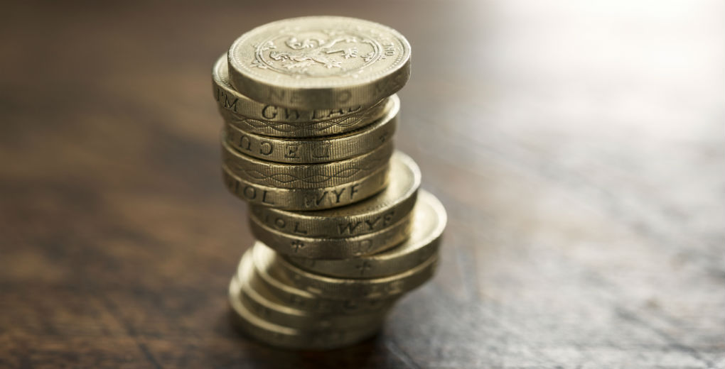 Pound coins in pile for Find Insurance NI blog