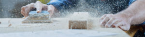 Man operating electric sander to depict tradesman insurance by Find Insurance NI