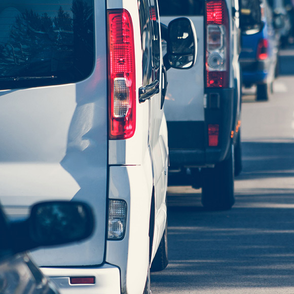 Van driving down road to depict van insurance by Find Insurance NI